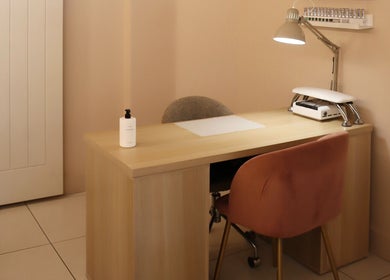 Elegant and serene nail salon desk at Lux - Clarkston, Glasgow, Scotland, GB, ready for a luxurious manicure.