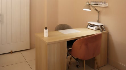 Elegant and serene nail salon desk at Lux - Clarkston, Glasgow, Scotland, GB, ready for a luxurious manicure.