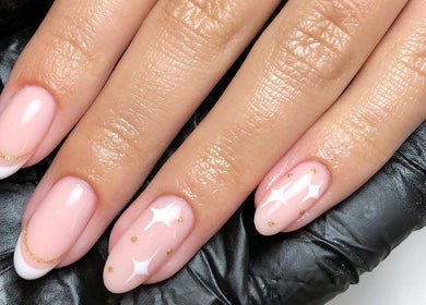 Elegant pink and gold nail art at Lux - Clarkston in Glasgow, Scotland, GB. Perfect for beauty enthusiasts.