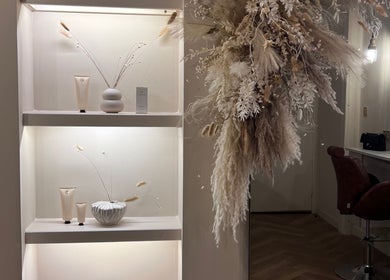 Lux - Cathcart's elegant shelf display with beauty products and floral decor in Glasgow, Scotland, GB.