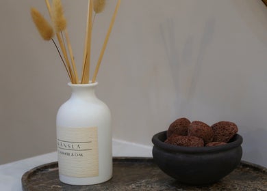 Elegant vase and stones at Lux - Cathcart, Glasgow, Scotland, GB for a calming ambiance.
