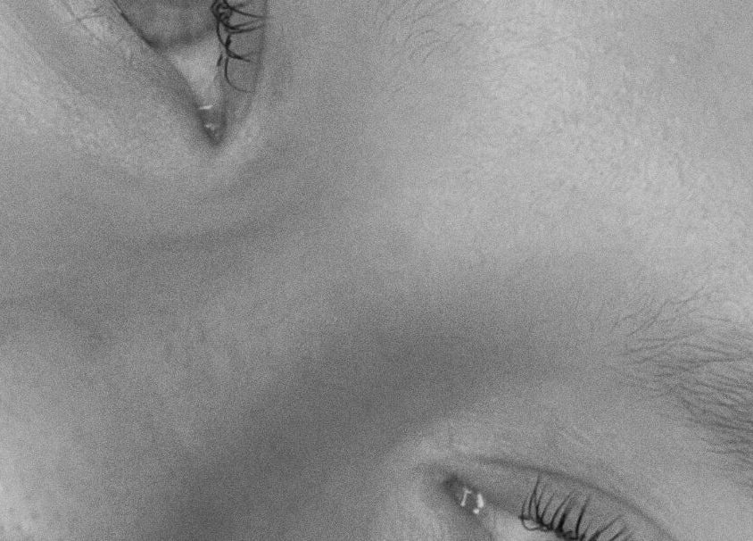 Close-up serene face highlighting peace at Aura Aesthetics Studio, Cessnock, AU.