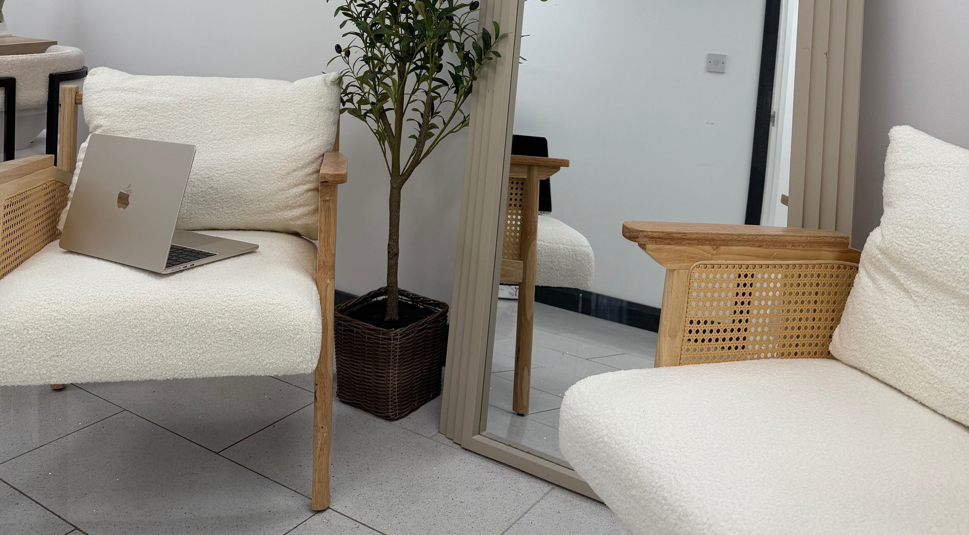 Cozy seating at The Mani Edit in Rugby, England, GB with elegant decor and modern touches.