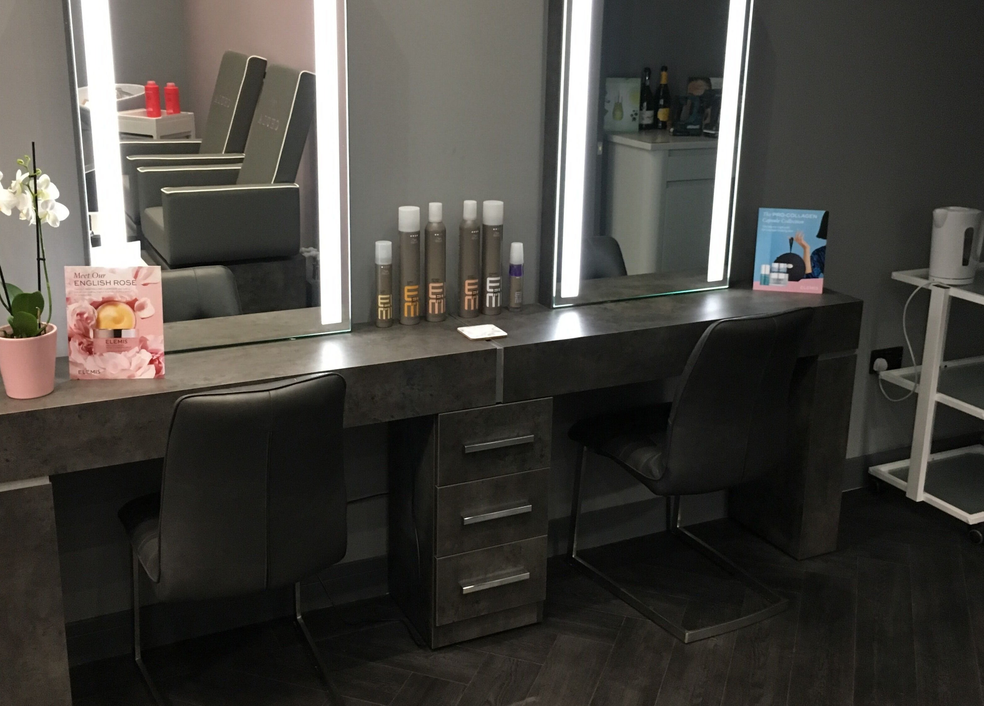 Elegant salon station at Chula, featuring sleek chairs and mirrors in Sheffield, England, GB.