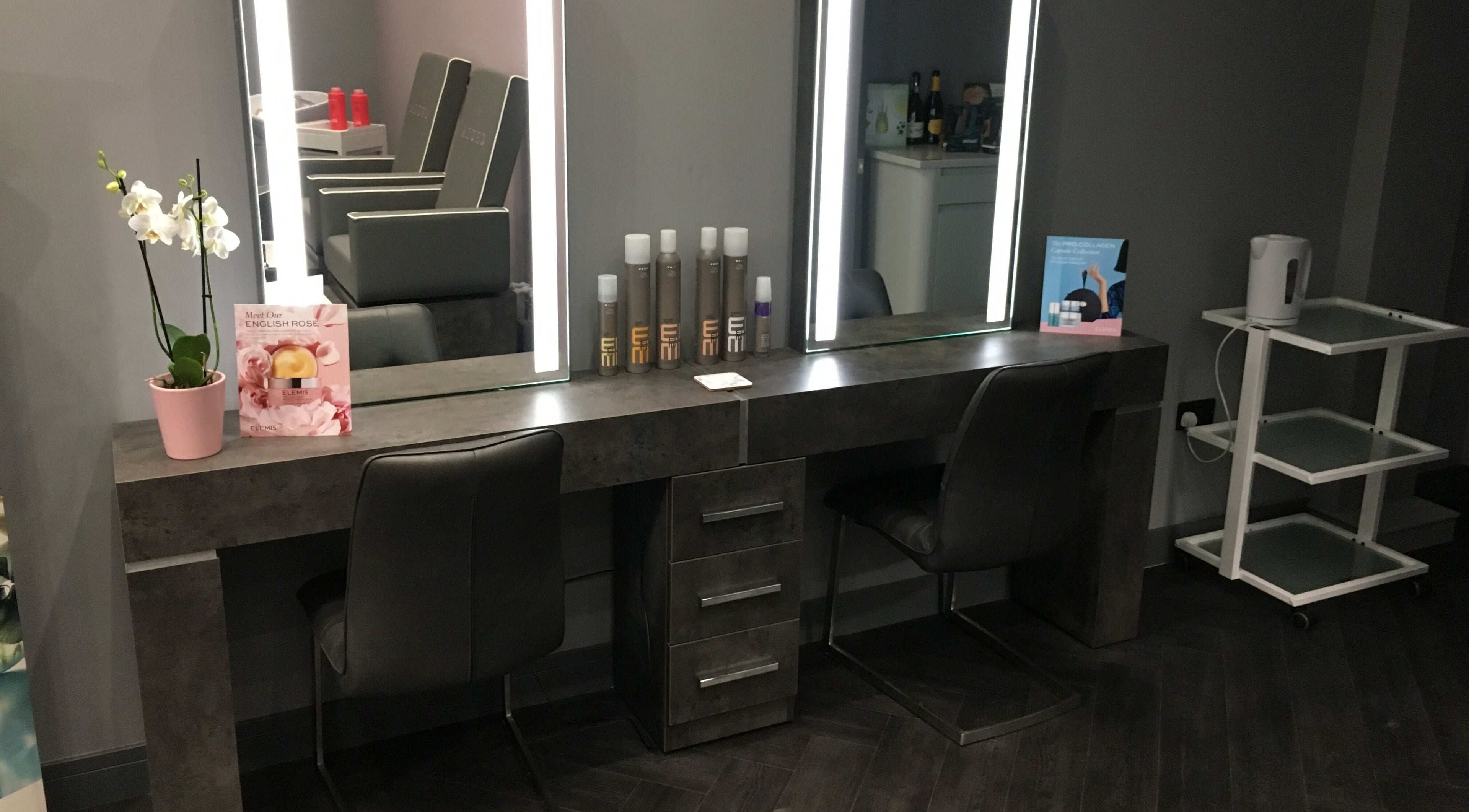 Elegant salon station at Chula, featuring sleek chairs and mirrors in Sheffield, England, GB.