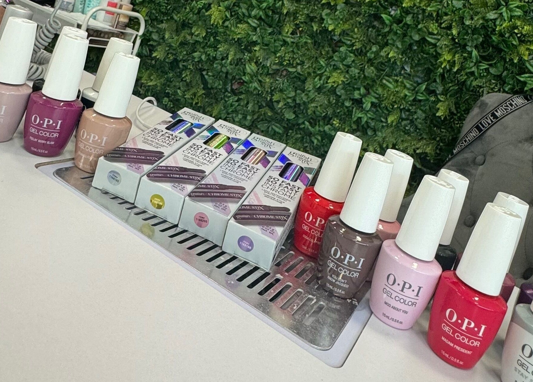 OPI gel nail polishes at Daniela Beauty Salon, Wolverhampton, England, GB, displayed on a stylish table.