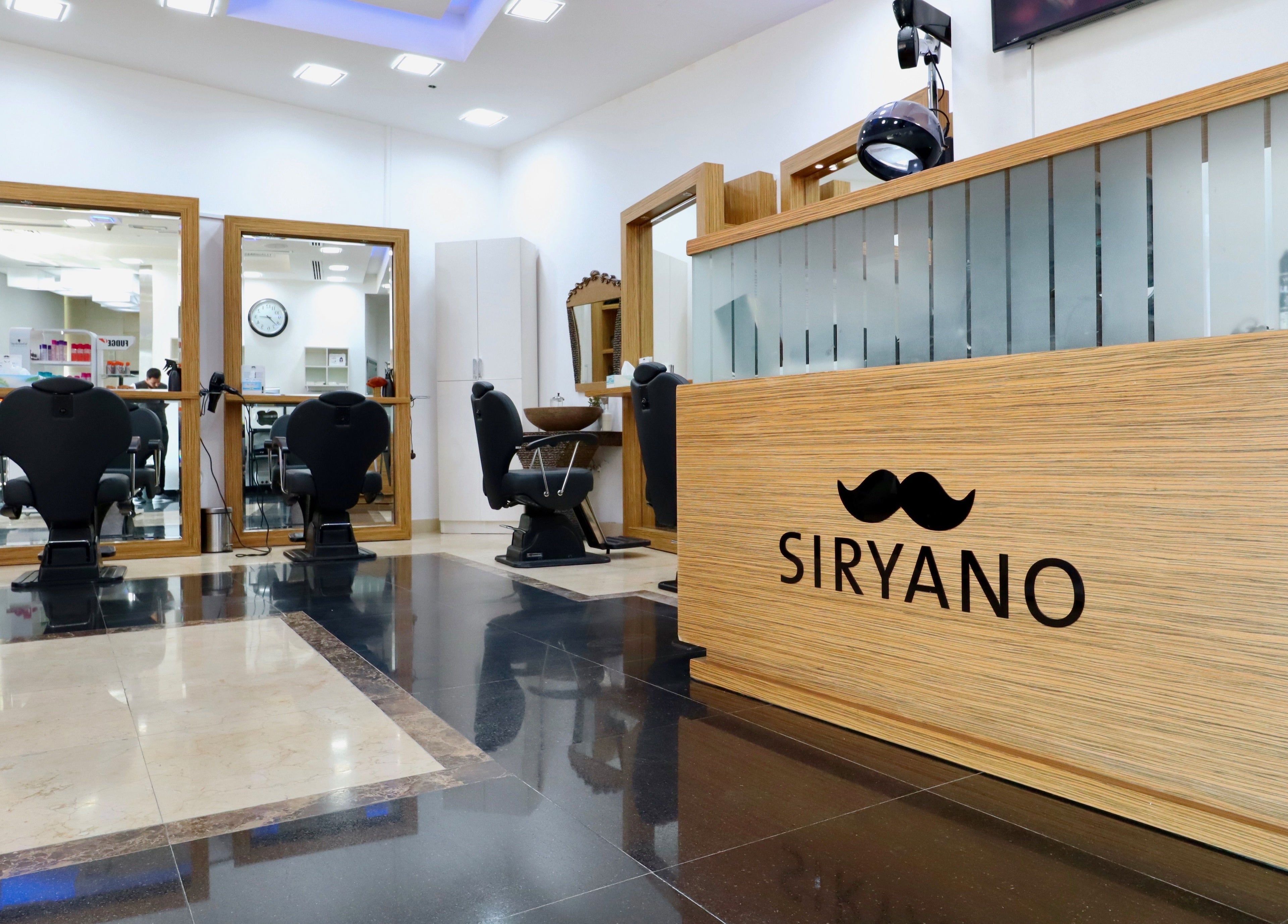 Siryano Gents Saloon and Spa, Escape Tower in Dubai, AE, showcasing a modern salon interior with styling chairs.