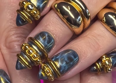 Elegant gold and blue nail art at Savage Nails, Auckland, Auckland, NZ showcasing intricate designs.
