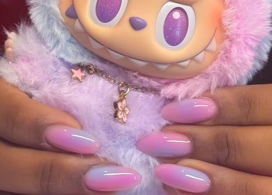 Elegant pastel ombre nails holding a cute plush at Savage Nails, Auckland, Auckland, NZ.