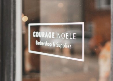 Courage Noble | King Street signage on glass door, Norwich, England, GB