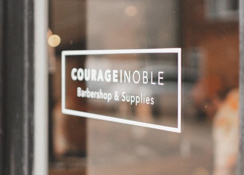 Courage Noble | King Street signage on glass door, Norwich, England, GB