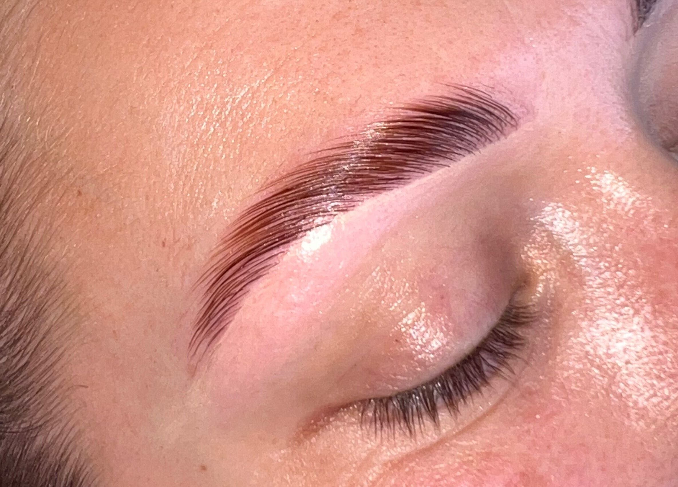 Close-up of expertly shaped eyebrows at AJ Aesthetics Lounge, Paddock Wood, England, GB.