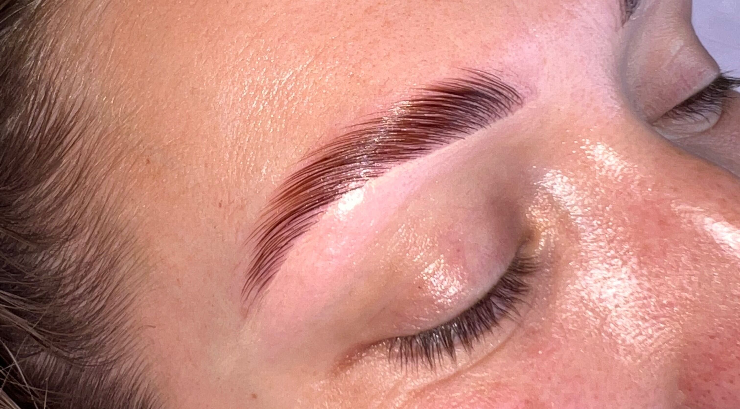 Close-up of expertly shaped eyebrows at AJ Aesthetics Lounge, Paddock Wood, England, GB.