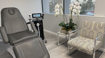 Modern treatment room at Skinsation LA featuring sleek decor and equipment in Los Angeles, California, US.