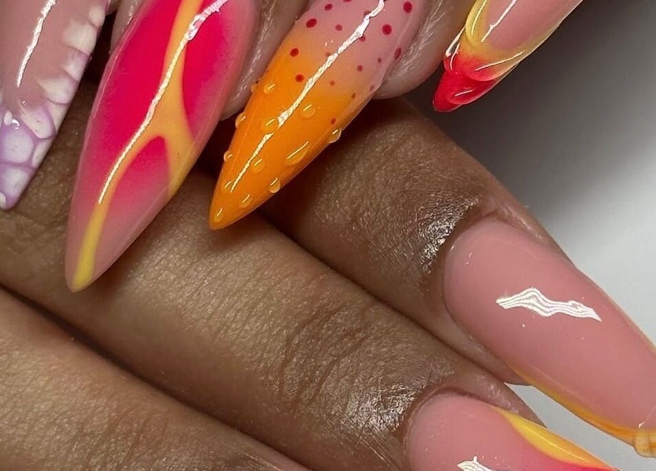 Vibrant nail designs at Prettifab 246, Saint Michael, BB. Flaunt stylish nails with creative patterns.