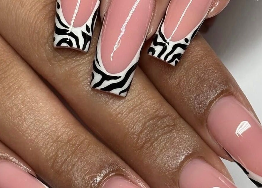 Stylish zebra nail art at Prettifab 246, Saint Michael, Saint Michael, BB. Perfect blend of elegance and trend.