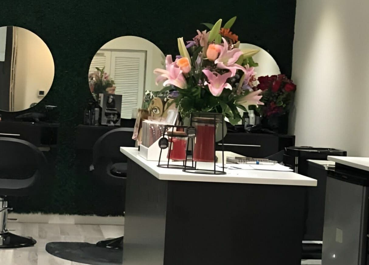 Sophisticated interior of Milaya Salon & Medical Spa in Port of Spain with stylish decor and floral accents.