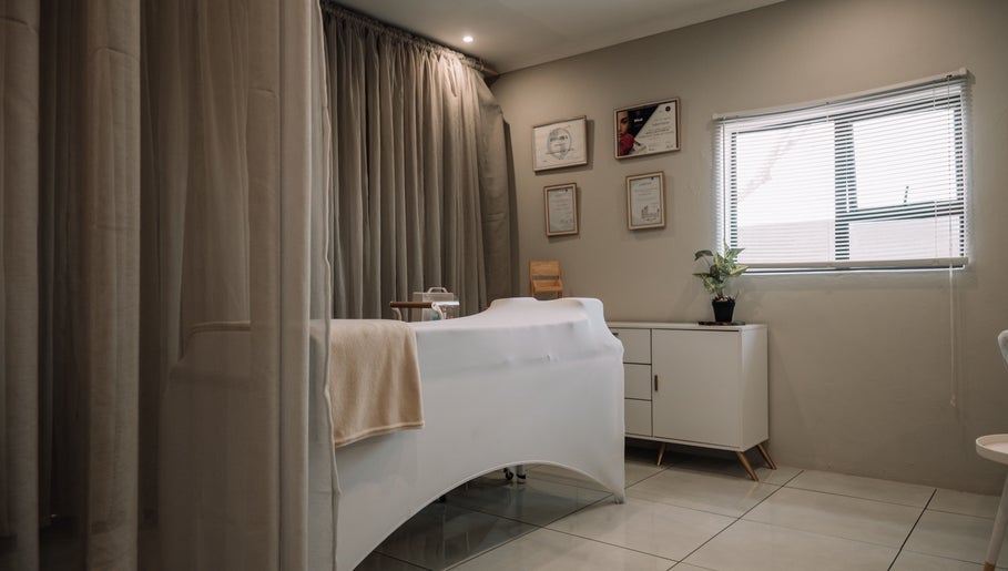 Calming treatment room at Snatched Cosmetics, Boksburg, Gauteng, ZA with soft lighting and cozy ambiance.
