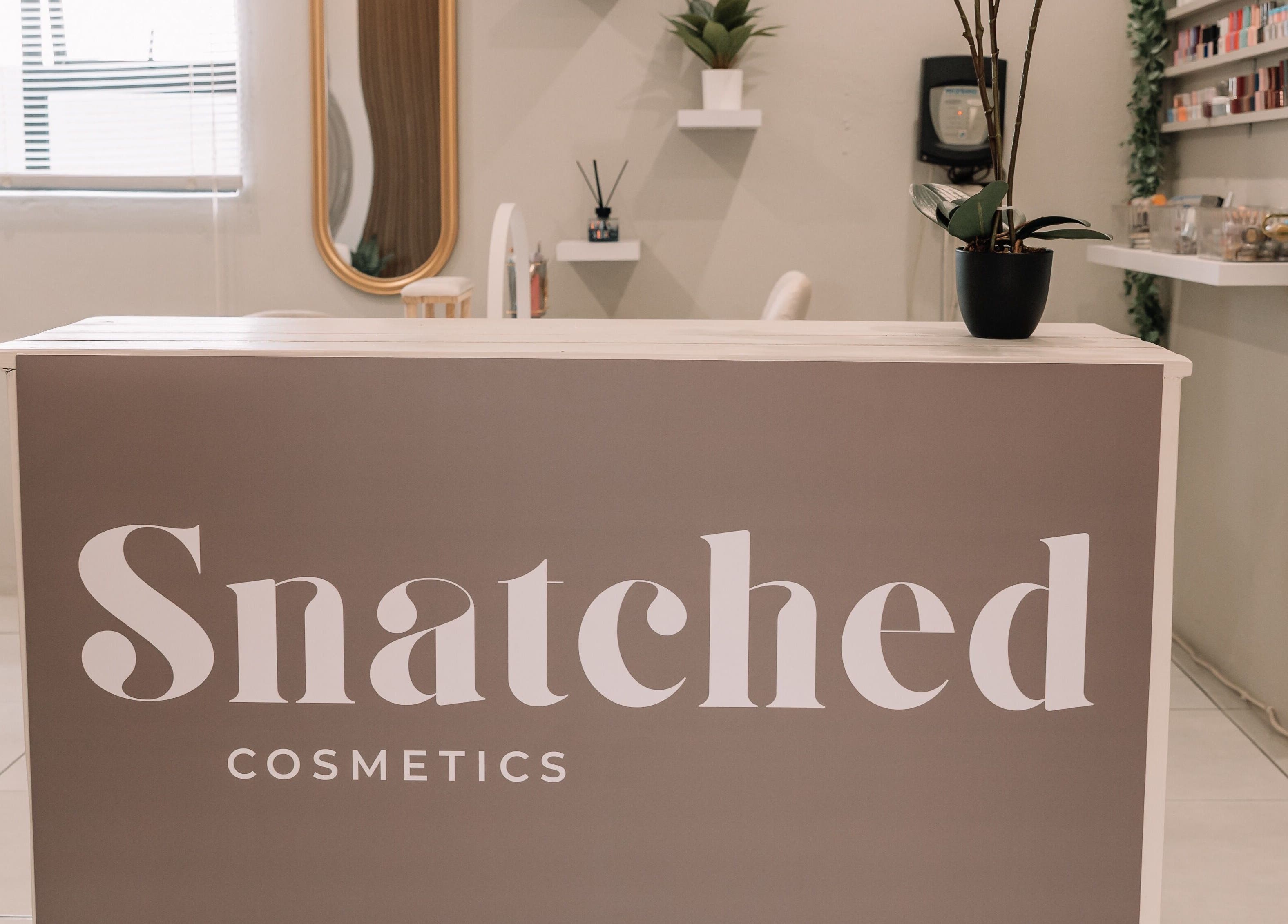 Elegant reception at Snatched Cosmetics in Boksburg, Gauteng, ZA, showcasing modern decor and welcoming vibe.