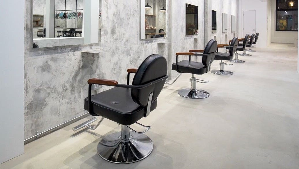 Stylish salon chairs at The Fluxus House, Singapore, Singapore, SG, highlighting a modern aesthetic.