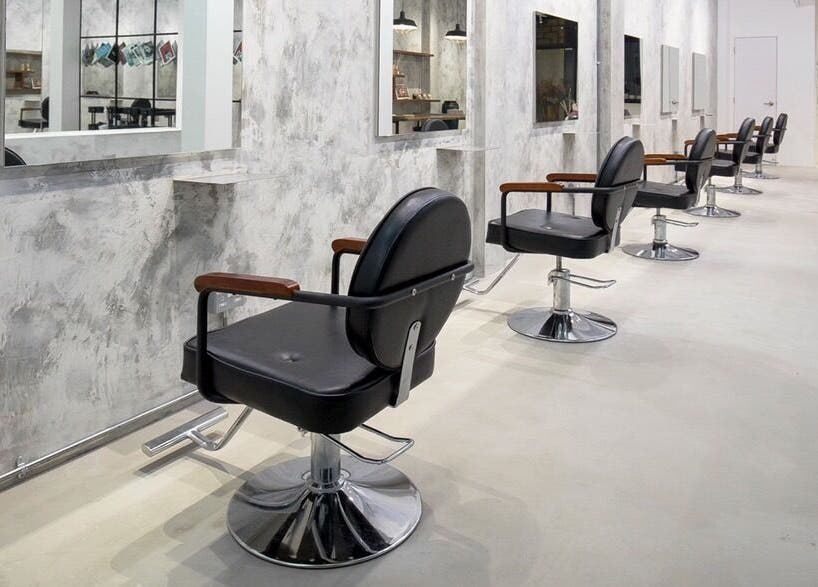 Stylish salon chairs at The Fluxus House, Singapore, Singapore, SG, highlighting a modern aesthetic.