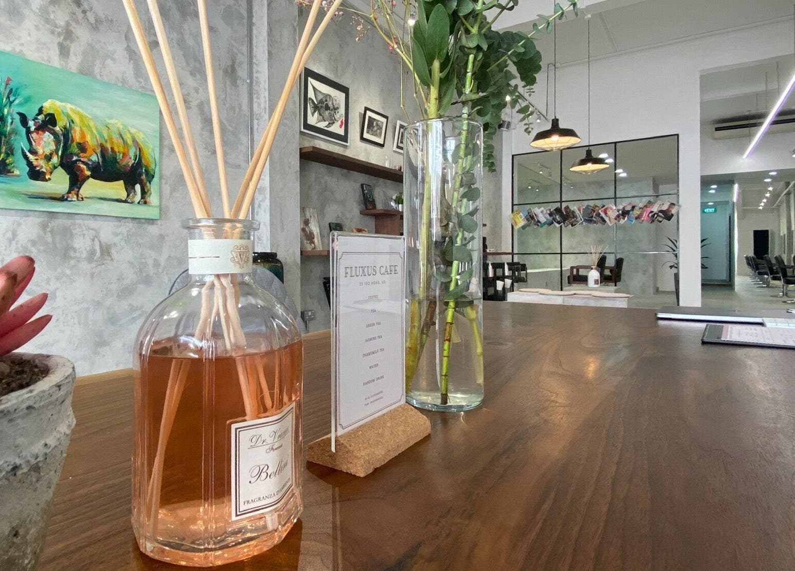 Elegant decor with rustic elements at The Fluxus House in Singapore, SG showcasing a serene beauty atmosphere.