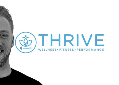 Smiling individual next to Thrive Kent logo, a wellness venue in Maidstone, England, GB.