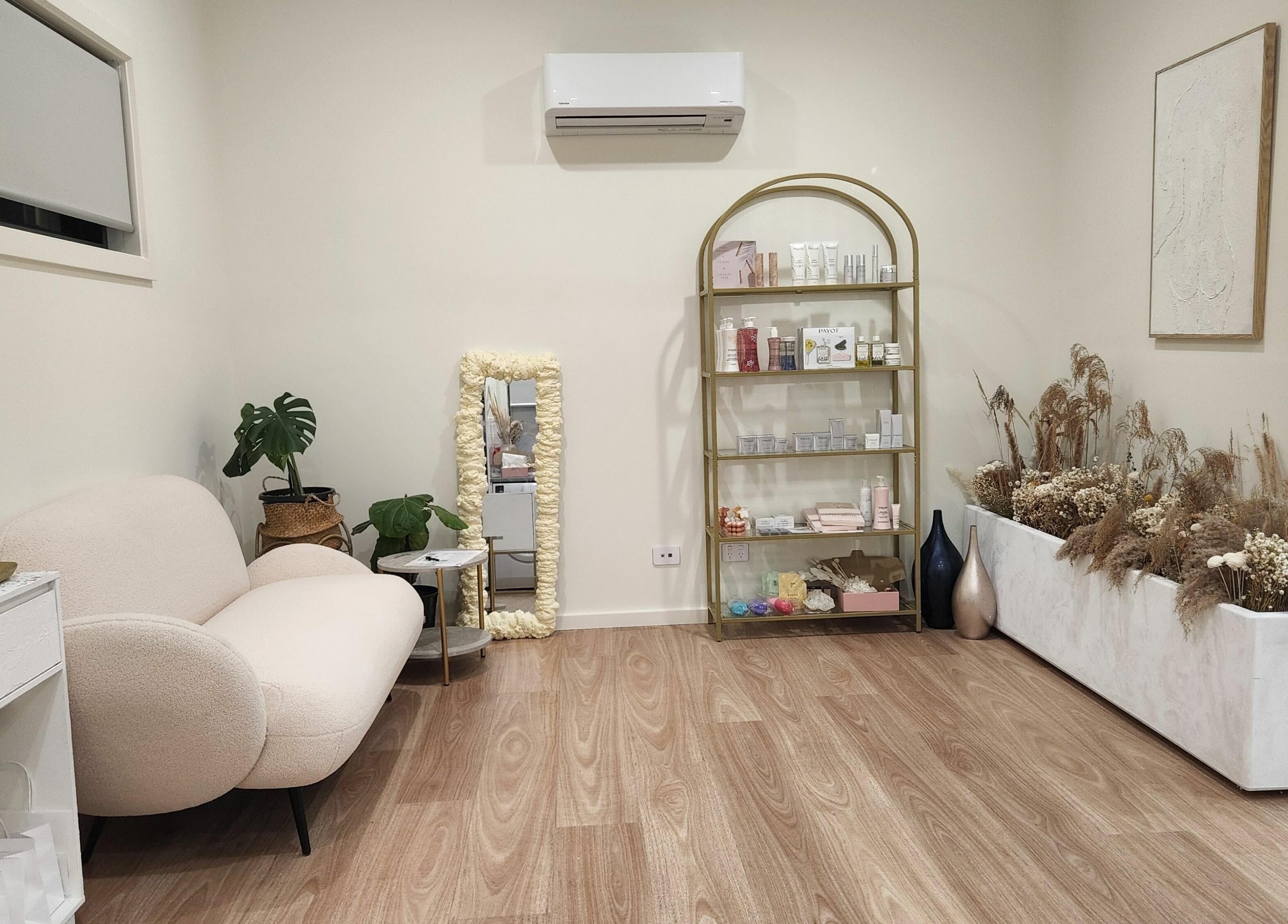 Cozy interior of Baske Beauty Studio, Giralang, ACT, AU featuring modern seating and elegant decor.