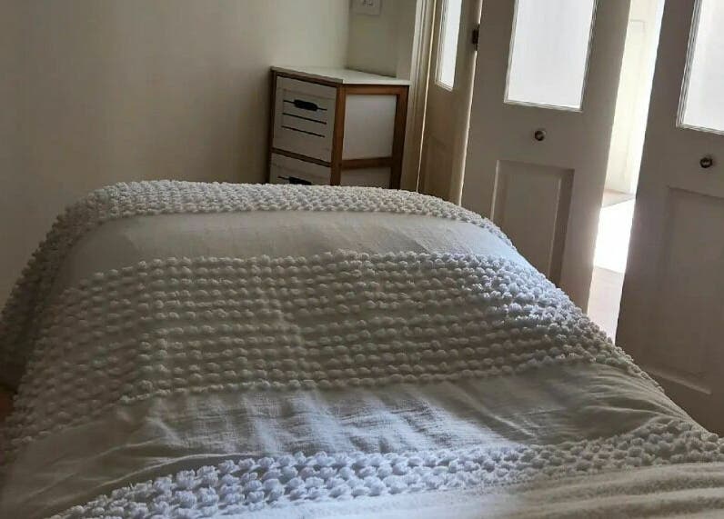 Relaxing treatment room at Baske Beauty Studio, Giralang, Australian Capital Territory, AU with soft lighting.