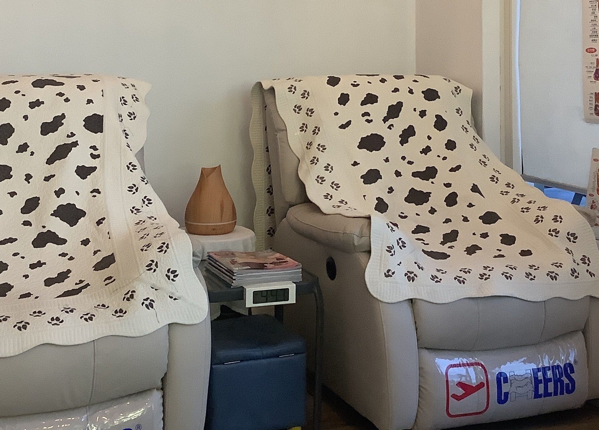 Comfortable massage chairs at Nee Massage | BICTON, Bicton, WA, AU adorned with patterned blankets.