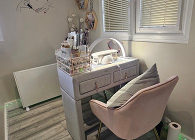 Chic nail station at Sophie's Glitz Nails & Beauty Salon, Attleborough, England, GB, with stylish furnishings.