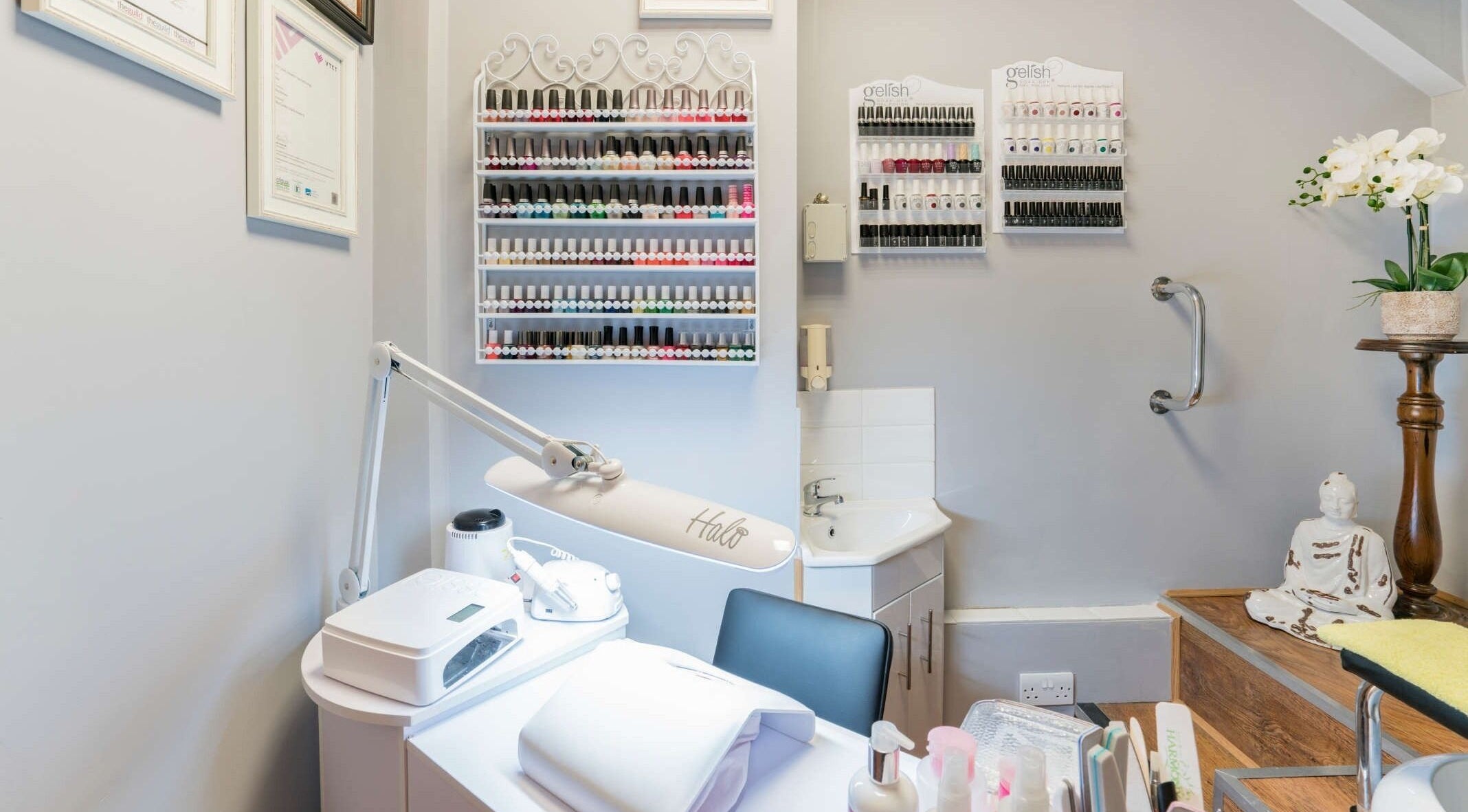 Nail care station at Beauty Spot by NP (Remix Salon), London, England, GB, with organized polish display.