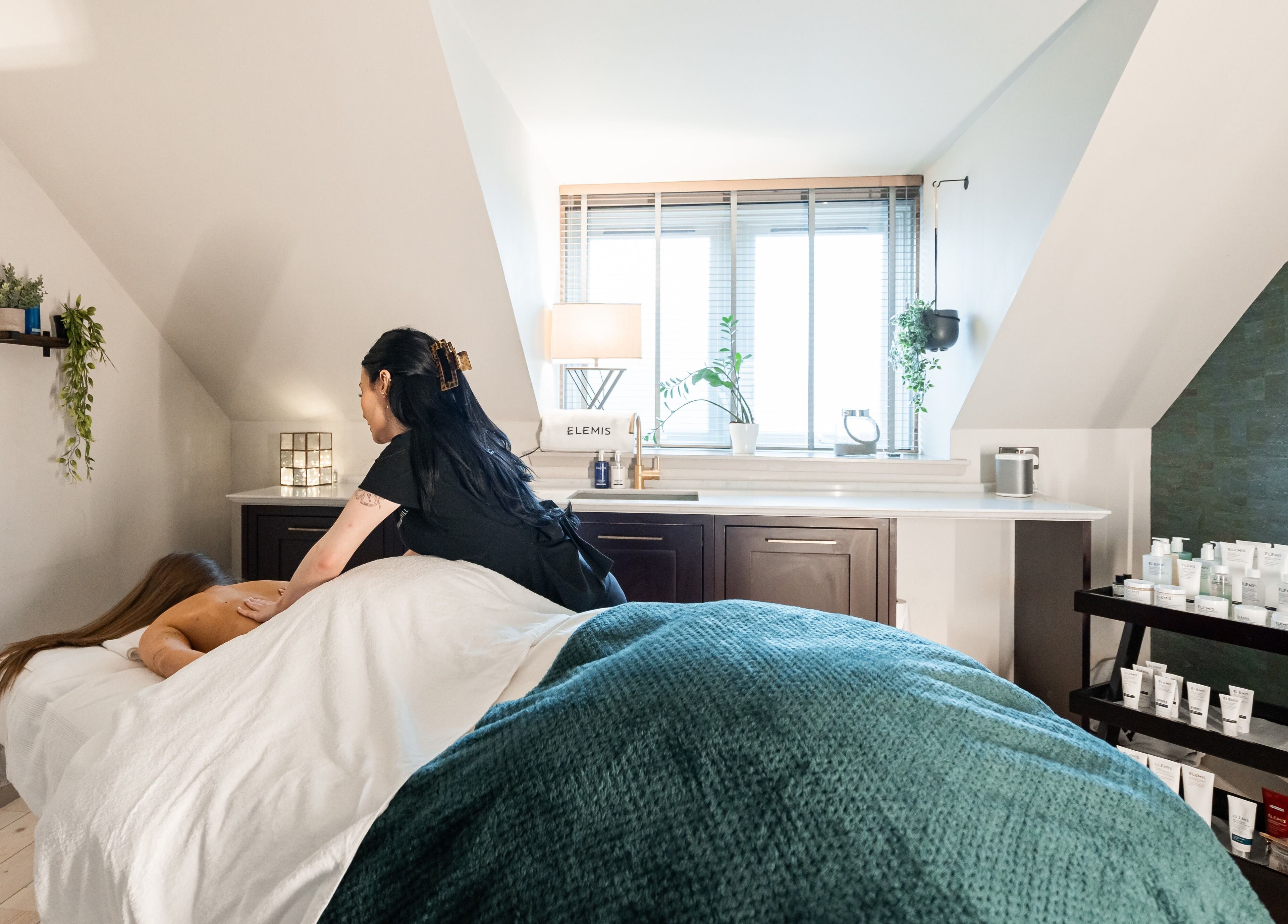 Massage session at Spa on the Hill, North Berwick, Scotland, GB. A serene treatment room with natural light.
