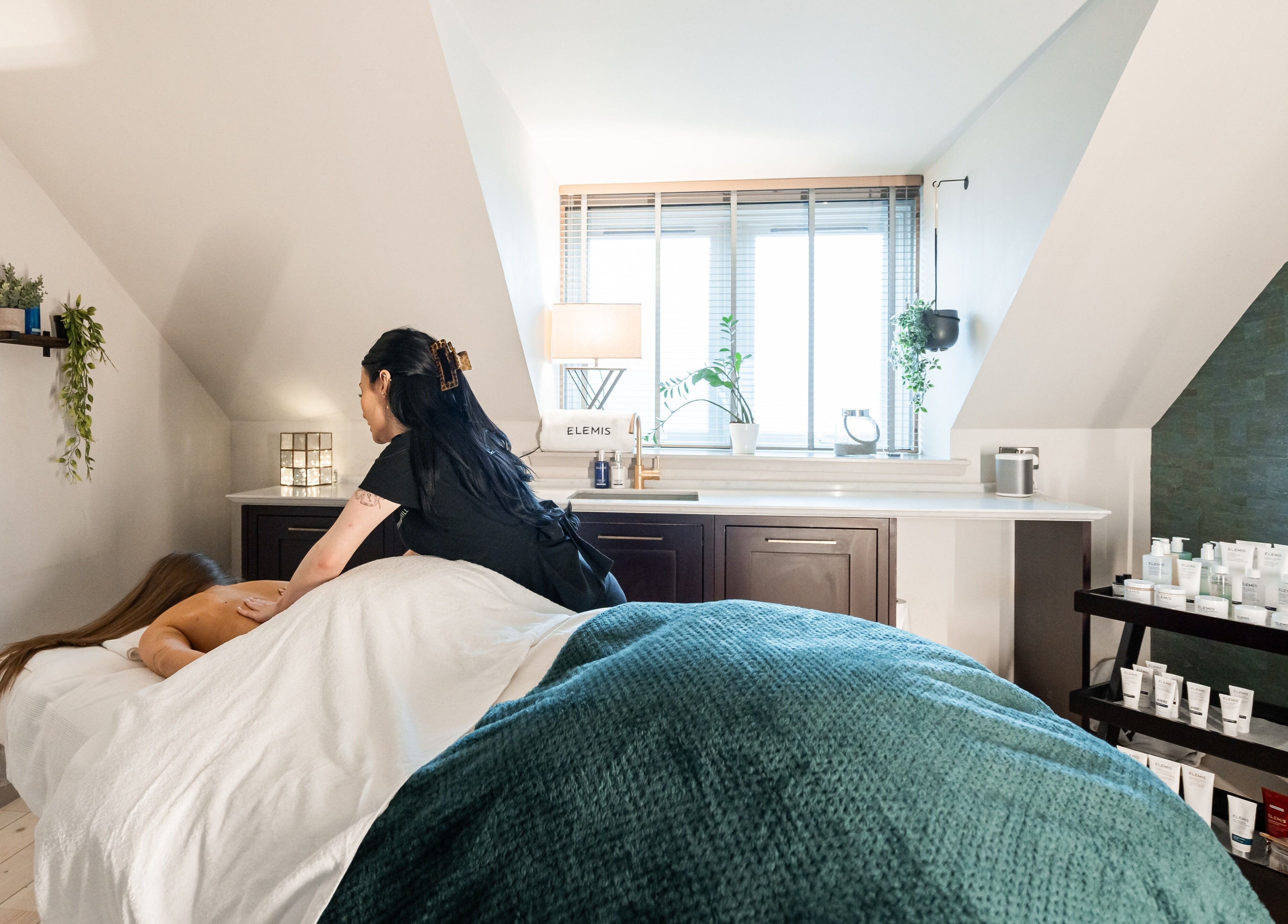 Massage session at Spa on the Hill, North Berwick, Scotland, GB. A serene treatment room with natural light.