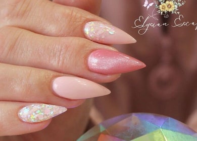 Stunning pink and glitter nails at Elysian Escape Day Spa, Germiston, Gauteng, ZA. Perfect nail art for any occasion.