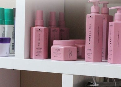 Elysian Escape Day Spa in Germiston, Gauteng, ZA features chic shelves with premium hair and beauty products.