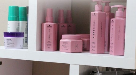 Elysian Escape Day Spa in Germiston, Gauteng, ZA features chic shelves with premium hair and beauty products.