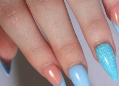 Elegant blue and peach nail design at Elysian Escape Day Spa, Germiston, Gauteng, ZA.