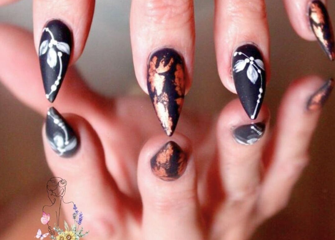 Elegant nail art design at Elysian Escape Day Spa, Germiston, Gauteng, ZA featuring black with floral details.