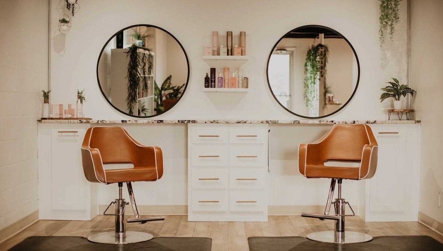 Elegant styling chairs at Whitefox Styling in Amarillo, Texas, US with modern mirrors and decor.