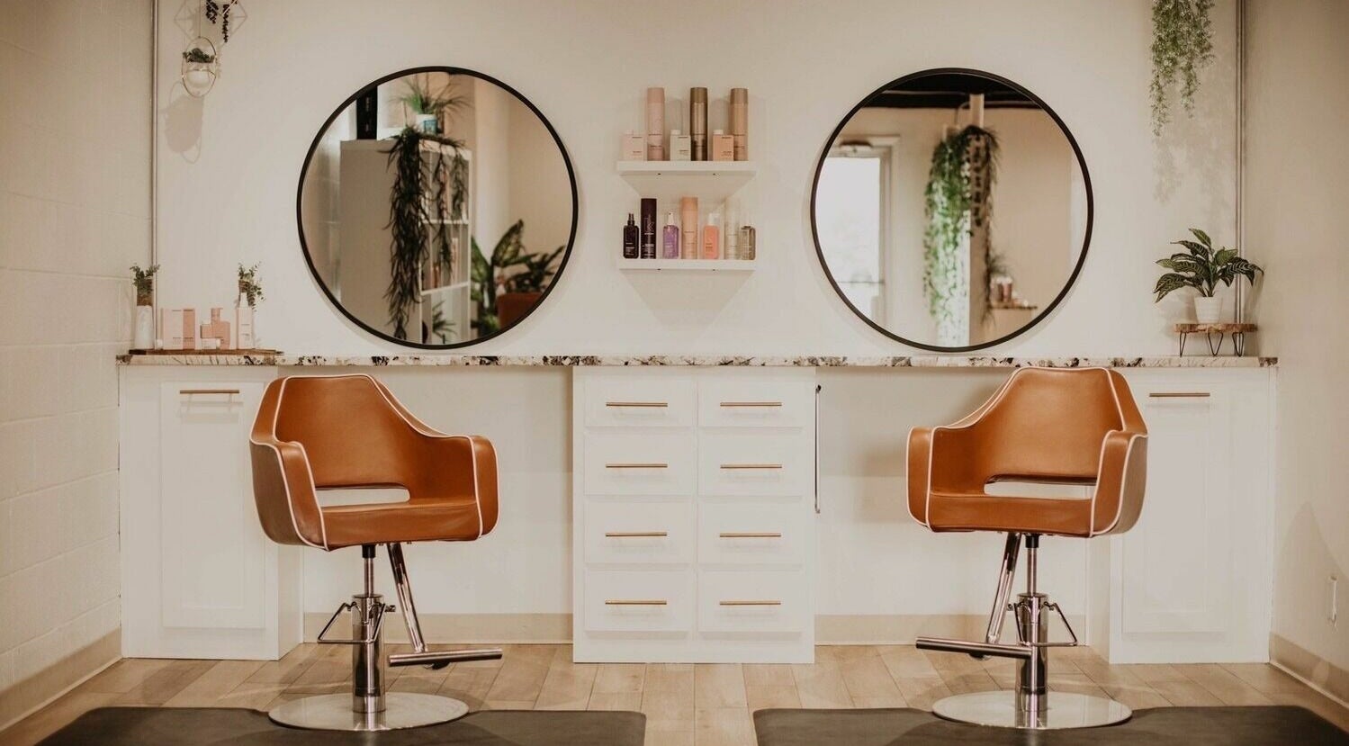 Elegant styling chairs at Whitefox Styling in Amarillo, Texas, US with modern mirrors and decor.