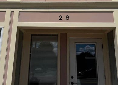 Entrance of Mirrored by Melissa in Webster, New York, US, featuring stylish architecture.
