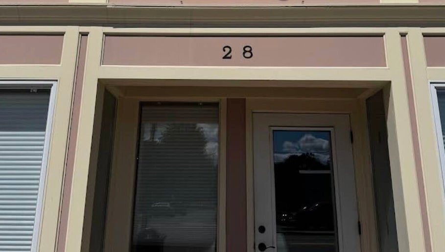 Exterior of Mirrored by Melissa | Root Rituals, Webster, New York, US; entrance at number 28.