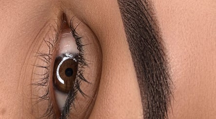 Detailed eyebrow styling at Lash and PMU Academy, Reading, England, GB. Expert precision and care shown.