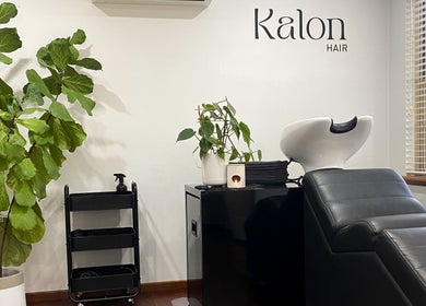 Relaxing hair wash station at Kalon Hair Perth, Perth, Western Australia, AU with lush greenery.