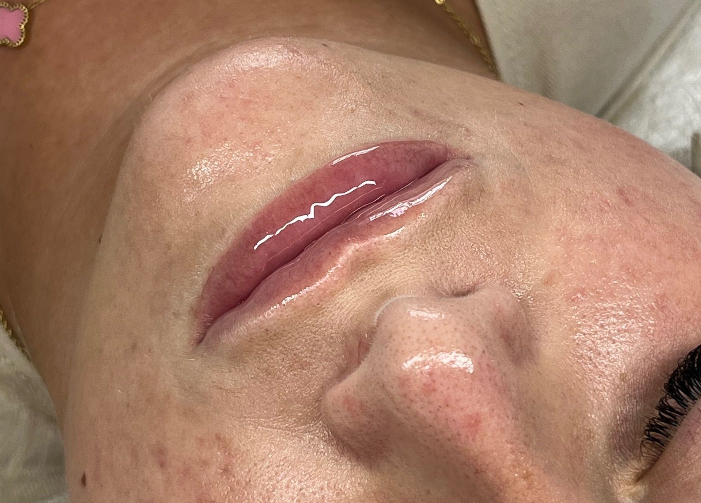 Close-up of glossy lips after treatment at Beauty by Soph, Peterborough, England, GB.