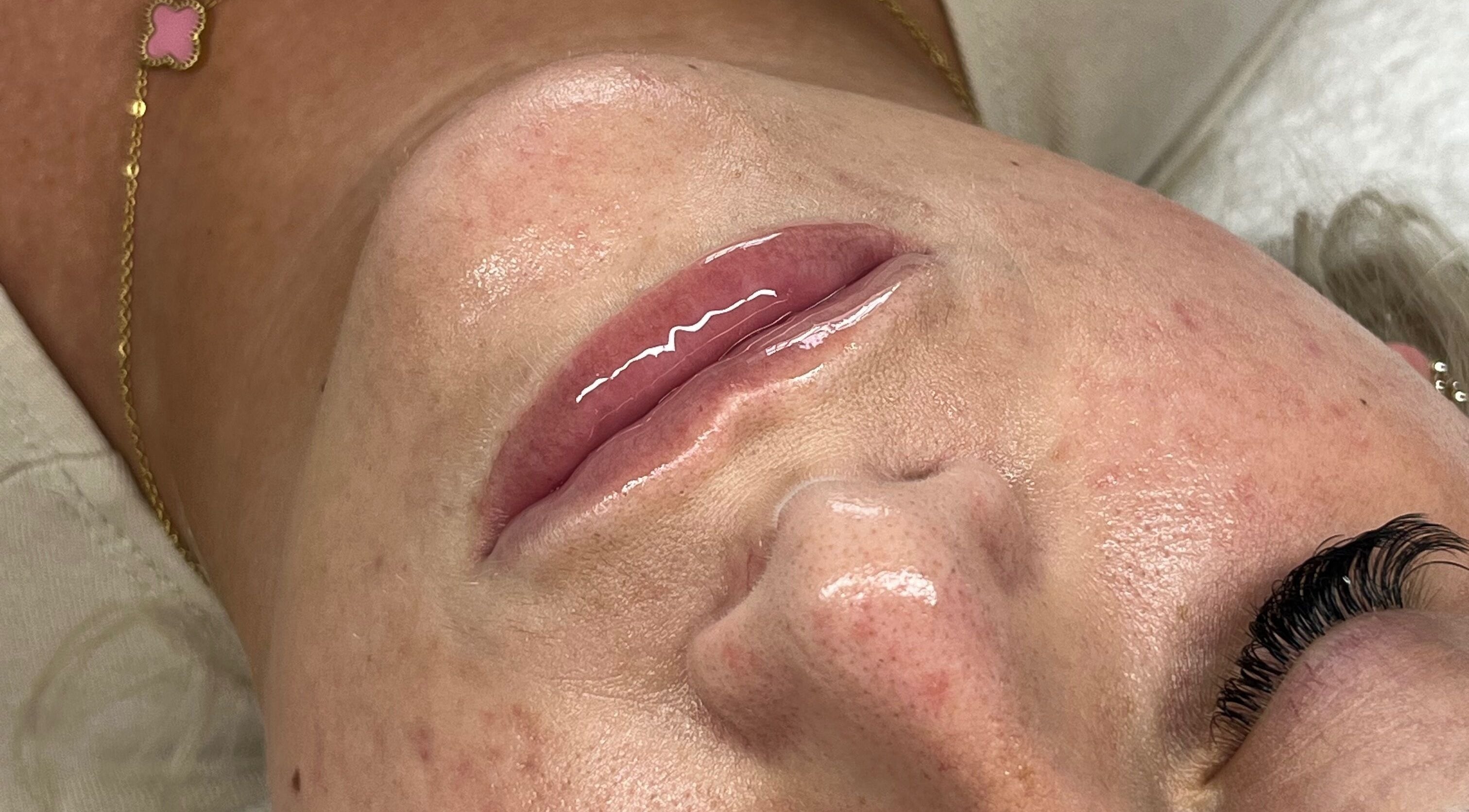 Close-up of glossy lips after treatment at Beauty by Soph, Peterborough, England, GB.