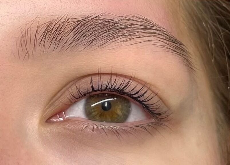 Close-up of an expertly shaped eyebrow and natural lashes at Beauty by Soph, Peterborough, England, GB.