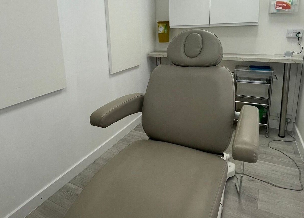 Modern treatment room at The Nurses Clinic, Nuneaton, England, GB with a plush reclining chair.