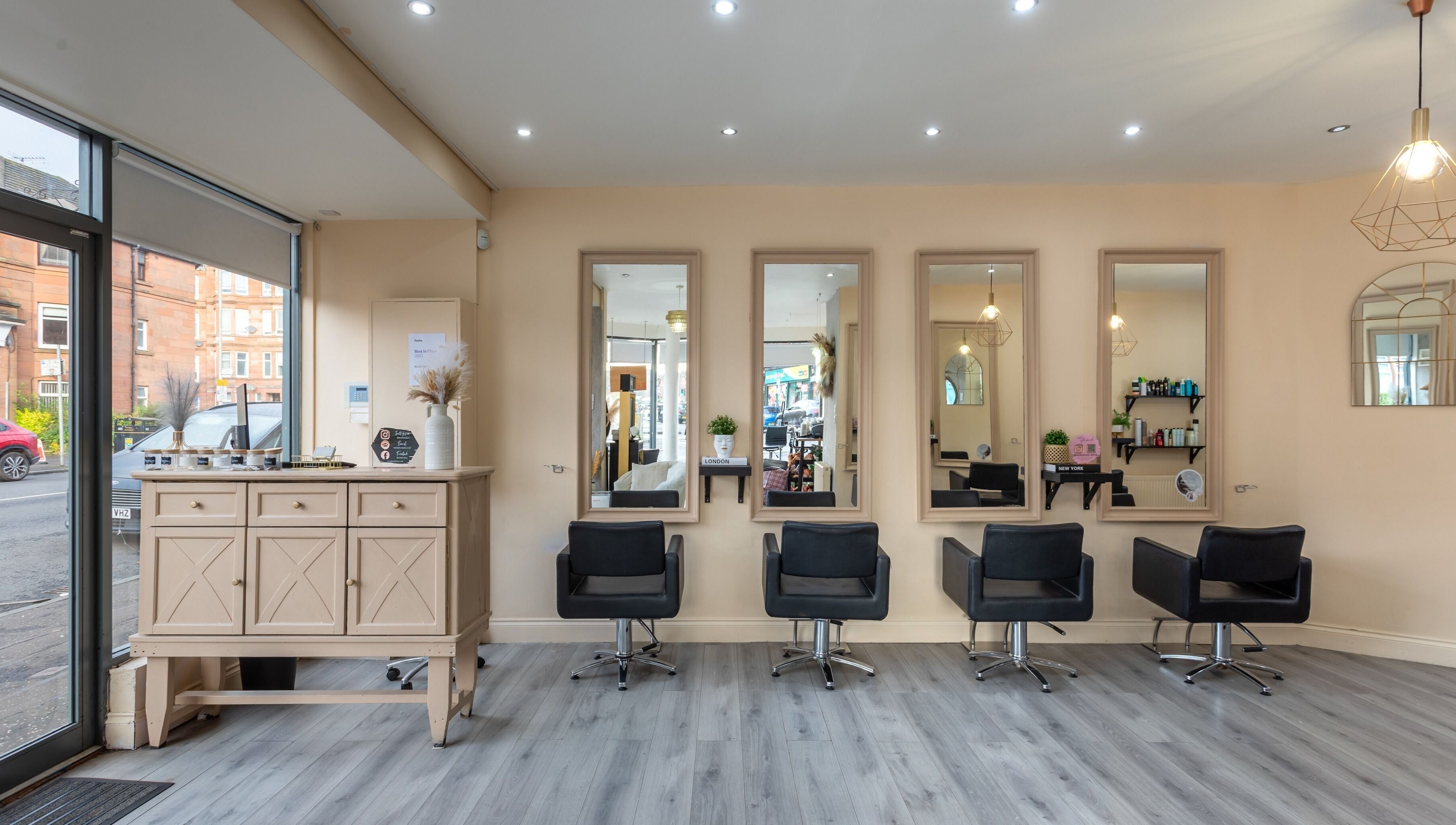 BLOND Salon interior with stylish chairs and mirrors in Glasgow, Scotland, GB.